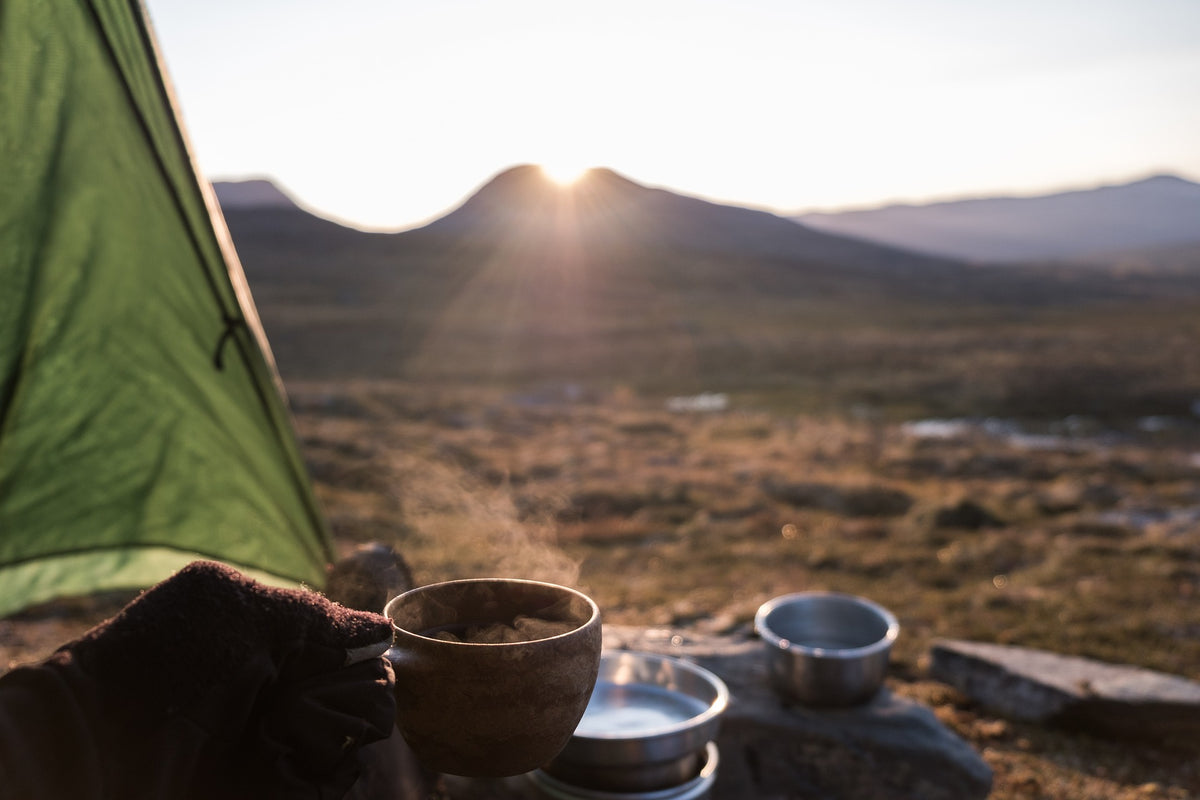 Looking out over the campfire outdoors