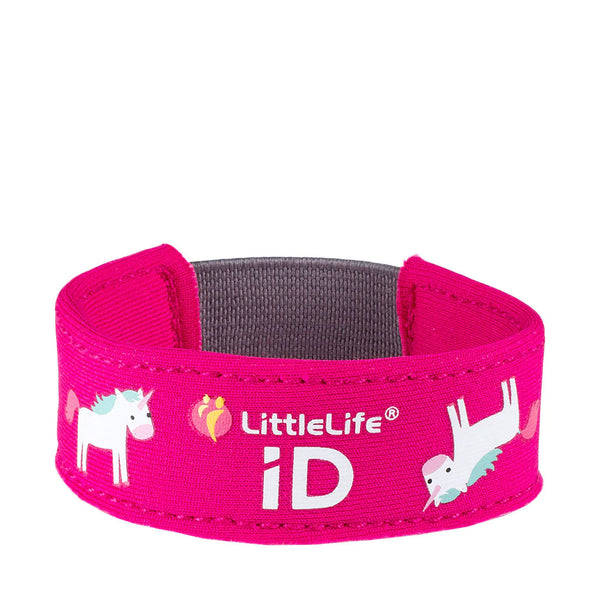 Studio shot on a white background of a Littlelife Identification wristband in the unicorn pattern