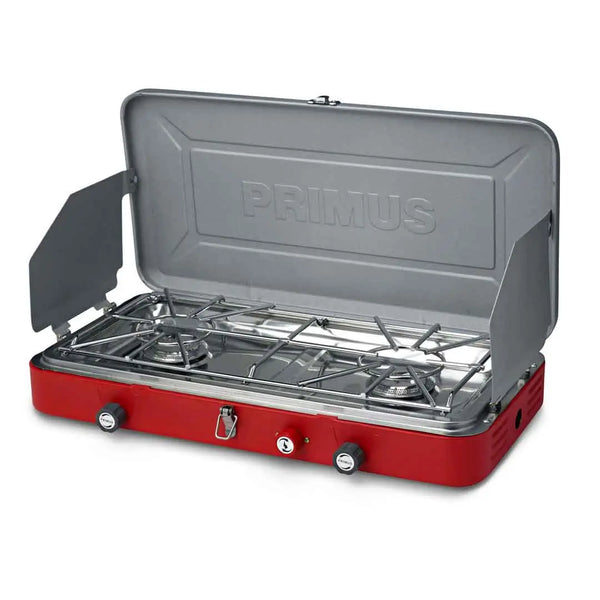 Primus Atle gas stove set-up with wind shields showingthe two burner rings