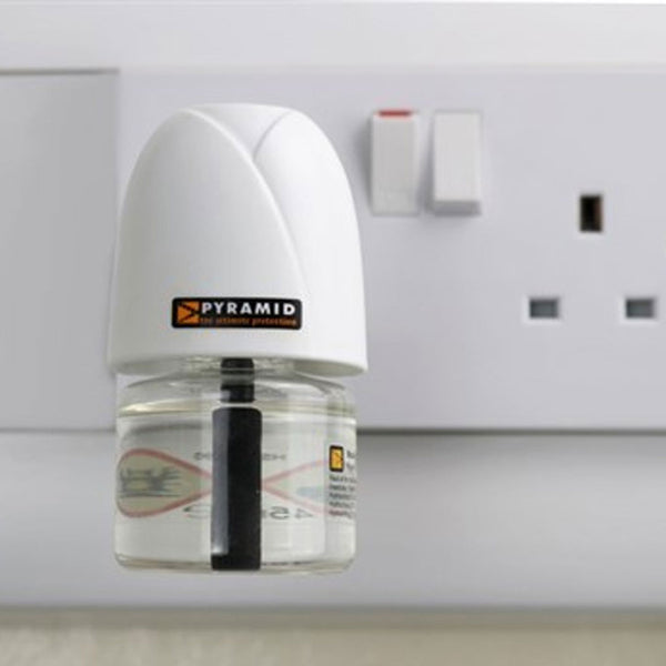 Lifestyle image of Pyramid Plug-in mosquito killer unit placed in a double electric socket
