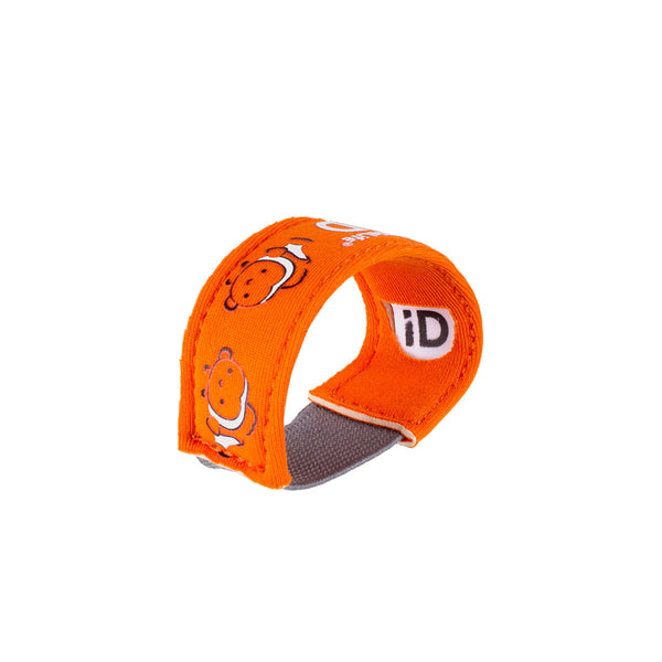 Studio shot on a white background of a Littlelife Identification wristband in the clownfish pattern on its side showing the slot for the ID information card